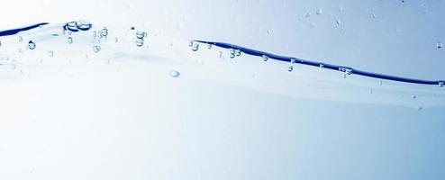 Water and bubbles on the blue water background photo