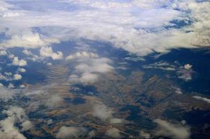 fields and clouds from airplane photo