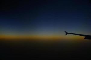 sundown airplane flight photo