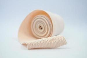 Elastic bandage on white background photo