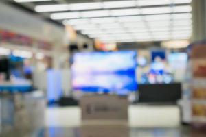 eletronic shop department store with bokeh blurred background photo