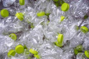 concepto de fondo de reciclaje de botellas de plástico foto