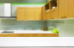 white wooden table with kitchen interior background photo