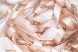 white and beige ribbon in sewing shop photo