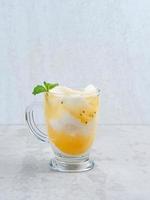 Es Kelapa Jeruk, a typical Indonesian drink made from fresh oranges squeezed with grated young coconut. photo