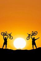 mountain bikers in the evening photo