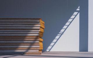 Stack of sandwich panels on the floor with sunlight and shadow on surface of cold storage room in freezer warehouse industry area photo