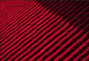 Abstract background design of diagonal red and black stripes in wall tiles pattern style, Unfinished layout of red and black wall tiles pattern for background design concept, illustration mode