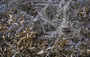 Background image of scrap brass and metal shavings for recycling photo