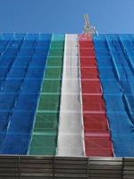 Italian flag on scaffolding photo