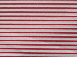 fondo de textura de tela de algodón rojo y blanco a rayas foto