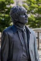 LIVERPOOL, UK, 2021. Statue of John Lennon of the Beatles in Liverpool, England on July 14, 2021 photo