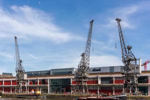BRISTOL, UK, 2019. View of Electric Cranes by the River Avon in Bristol on May 13, 2019. Unidentified people photo
