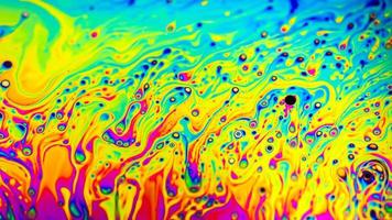 Extreme close-up of the colourful surface of a bubble photo