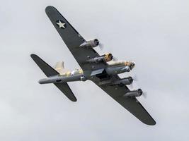 Memphis Belle Boeing B 17 Sally B bomber flying over Biggin Hill airfield photo