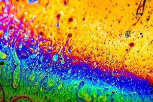 Extreme close-up of the colourful surface of a bubble photo