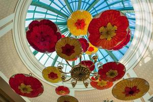 LAS VEGAS, NEVADA, USA, 2011. Parasols Suspended From the Ceiling of the Bellagio Hotel