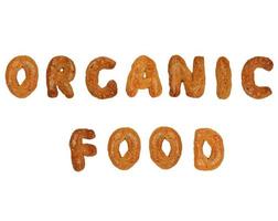 Organic food written with gingerbread biscuits cookies photo