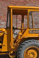 An old tractor vehicle machinery used in agriculture or construc photo