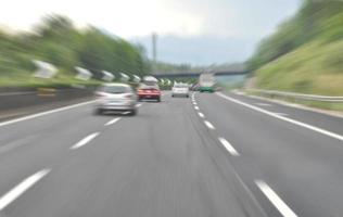 Motion blur effect of speed from car on motorway photo