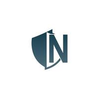 Shield logo icon with letter N beside design vector