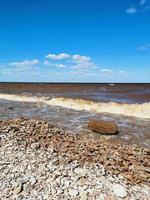 Rocky beach of lake or sea photo