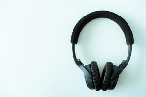 Modern wireless on ear headphones on the white background with copyspace. photo