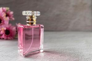 pink perfume bottle with pink flowers