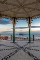 BRIGHTON, EAST SUSSEX, UK, 2018. View of the derelict West Pier from a Bandstand in Brighton East Sussex on January 26, 2018. Unidentified people photo