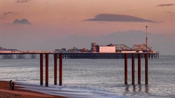 BRIGHTON, EAST SUSSEX, UK, 2018. View of Brighton Pier in Brighton East Sussex on January 26, 2018. Unidentified people. photo