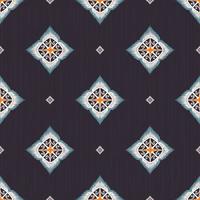 Colorful ikat ethnic tribal geometric flower shape seamless pattern on black background. Use for fabric, textile, interior decoration elements, upholstery, wrapping. photo