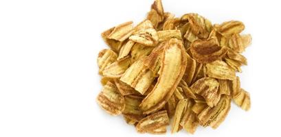 Asian caltivated banana or pisang awak banana cracker ro banana chips on white background, soft and selective focus. photo