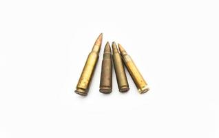 isolated old ak and m16 bullets on white background, soft and selective focus. photo