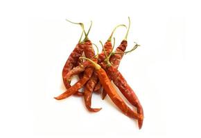 Dry red chillies on a white background