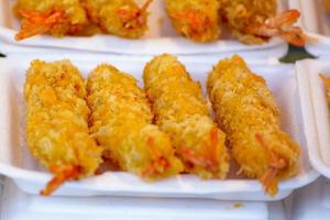 Fried shrimp coated with bread crumbs photo