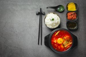 tofu and yolk boiled in spicy soup photo