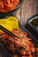 korean food. Jeyuk Bokkeum or fried pork in korean style sauce photo