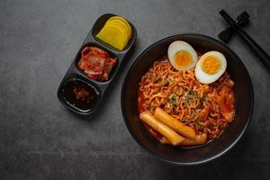 Korean instant noodle and tteokbokki in korean spicy sauce, Ancient food photo