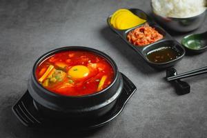 tofu and yolk boiled in spicy soup photo