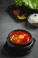 tofu and yolk boiled in spicy soup photo