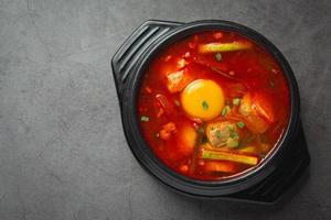 tofu and yolk boiled in spicy soup photo