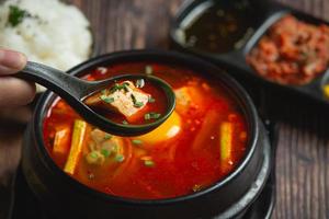tofu and yolk boiled in spicy soup photo