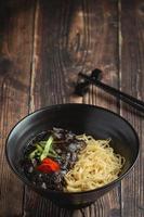 korean food. Jajangmyeon or noodle with fermented black beans sauce photo