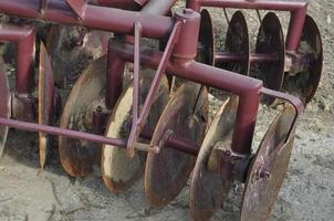 disc plough for soil breaking photo