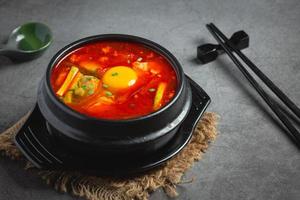 tofu and yolk boiled in spicy soup photo