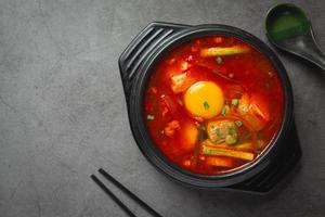 tofu and yolk boiled in spicy soup photo