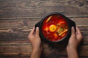 tofu and yolk boiled in spicy soup photo