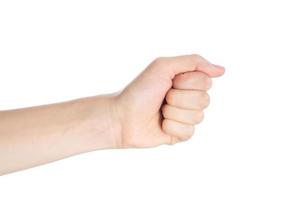 Woman hand show fist gesture isolated on a white background photo