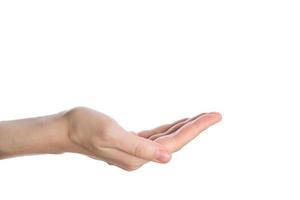 open empty woman palm isolated on a white background, begging gesture photo