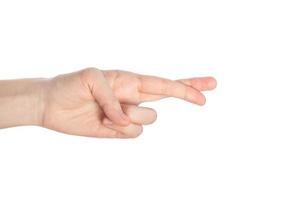 Fingers crossed outline, untruth gesture isolated on a white background photo